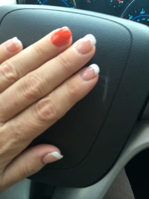 Great French manicure! I added the one orange nail to celebrate the Browns.