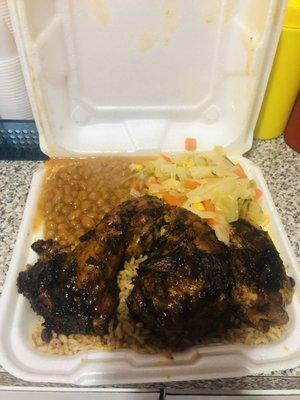 Jerk chicken, rice and peas, cabbage, baked beans