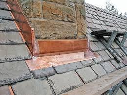 Custom copper chimney flashing.