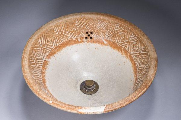 Schumacher Ceramics  hand-thrown basins. Stoneware, carved southwest design.