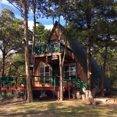 Lily Ponds Cottage is totally nestled in nature and faces a pond with water lilies and pond pier.