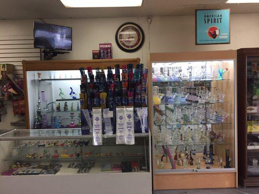 Selection of bongs, vape pens and pipes.