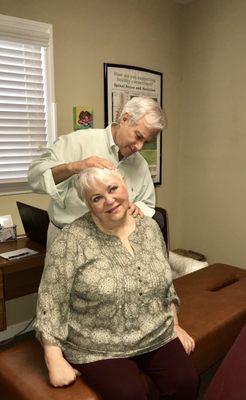 Dr. Margolies performing a chiropractic examination on one of his patients.