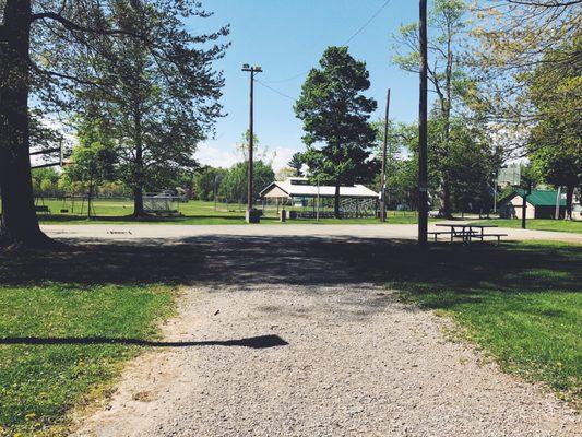 Basketball court and one of the park shelters a skip and hop across the distance.