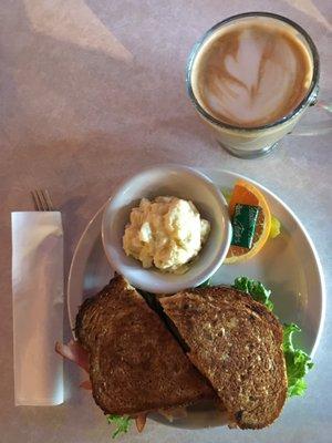 Coconut flavored latte and Ham & Cheddar sandwich #Winning