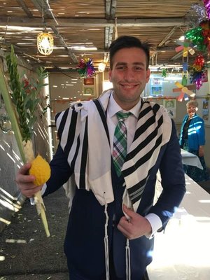 Cantor David Krasner in our Sukkah with Co-President Diane Hanson