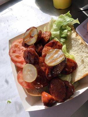 Smoked sausage po' boy.