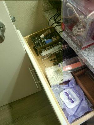 Bathroom drawer does not open if bathroom door is open. Shallow depth and length