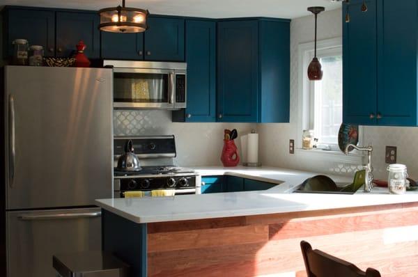 Recent kitchen  update project in Warwick. New custom painted cabinets, vintage tile, Cambria quartz counters and copper accented hardware.