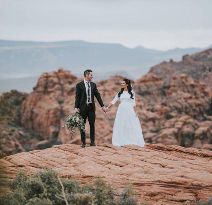 What a beautiful couple and view! We are so glad we can be a part of Savannah and Vance's special day!  Schedule a fitting today!