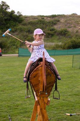 Children (and adults) can try polo themselves, on real and wooden horses.