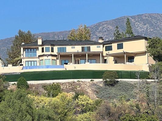 Beautiful La Canada House all milgard Ultra black on black windows installed new construction style re stucco