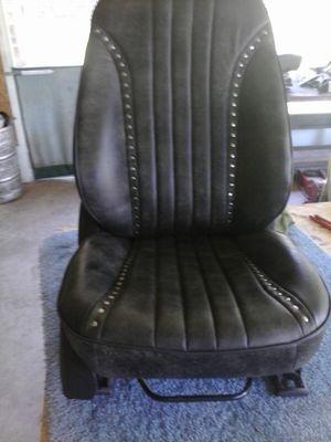 Custom seat with distressed leather & studs