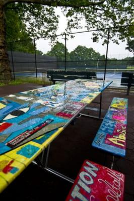 Children's artwork table at the courts entrance