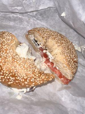 za'atar bagel - sesame bagel with tomato, olives, za'atar-infused cream cheese