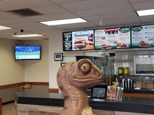 Bob the Raptor says, "This is where you order the prey!"