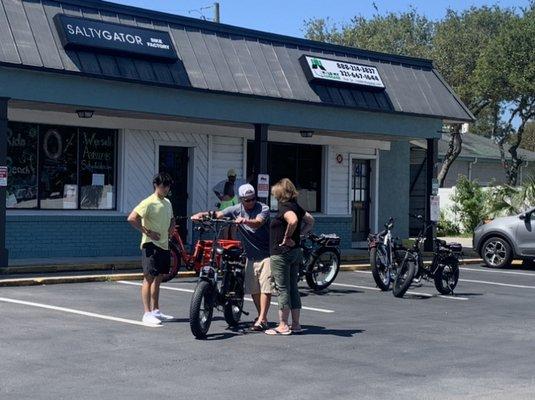 Mike, owner, going over the E-bike do's and don'ts with my 70 year mom. did test runs in parking lot.