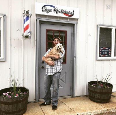 Me outside my shop with my pup Marley