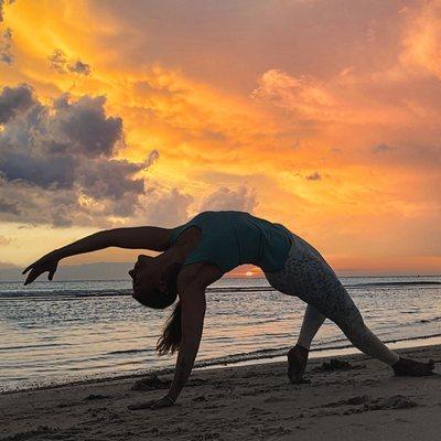 Bendy beach babe Victoria soaking in the last bit of sun on Pass-a-Grille Beach.