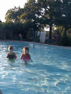 The Littles standing in the pool and touching the bottom, they loved it!