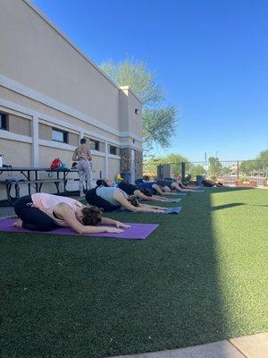 Sometimes we bring the yoga outside. :)