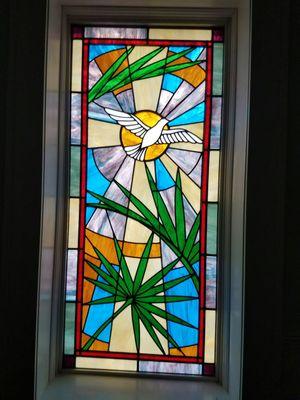 Safe place to explore your faith. This window is in the prayer room.