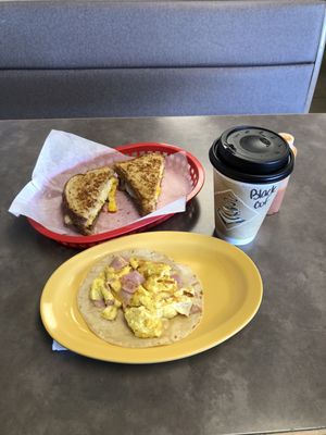 Breakfast sandwich. Ham taco coffee