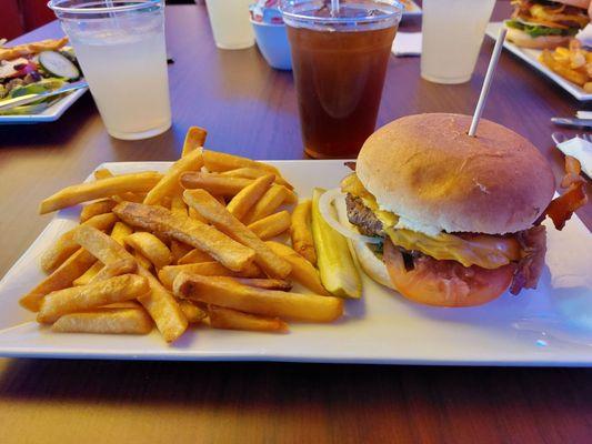 Frozen burger, fries and a very sad pickle