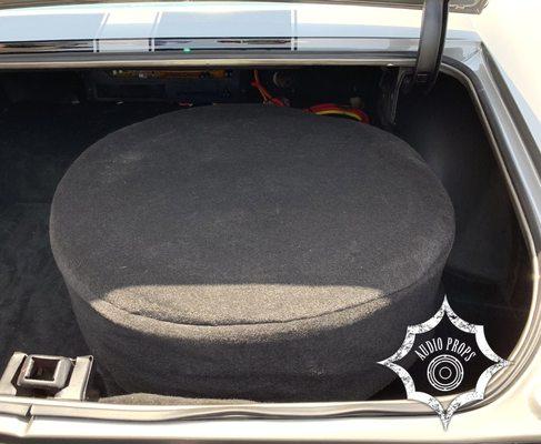 Custom fabricated subwoofer box which is installed in 1972 Chevelle SS with cover to conceal inside the trunk