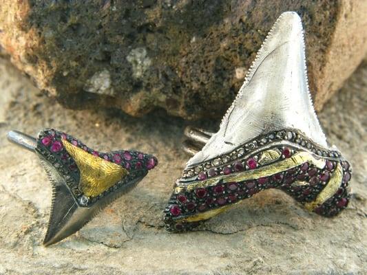 24K and oxidized silver tooth rings with rubies and diamonds.