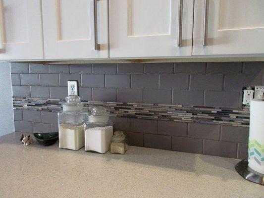 Our new backsplash looks great with the "Stellar Snow" quartz countertops.