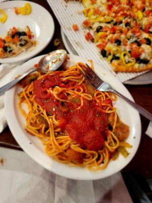 Uncle spaghetti special- pasta topped with marinara, sausage, and peppers. Half size.