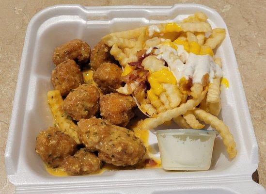 8-piece Garlic Parmesan Boneless wings, fries (+1.99 to upgrade to ultimate toppings)