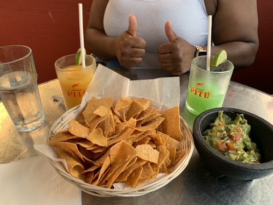 Yummmmmmmm! Chips, Guacamole and 2 Frozen Margaritas.