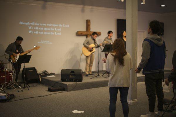 Singing songs together in praise to the Lord.