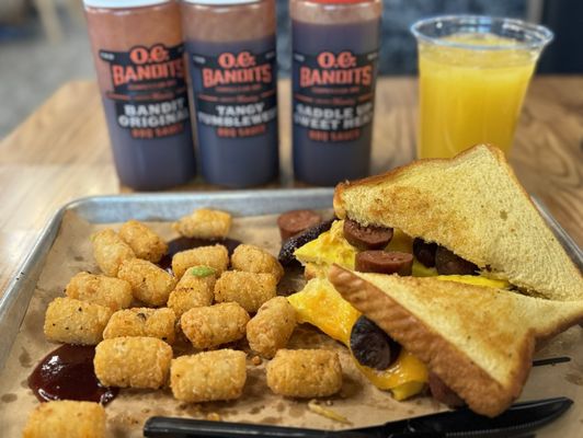 Breakfast sandwich and tots with O.G. Bandits BBQ. Yum!