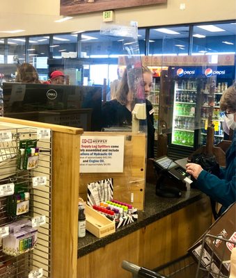 Plexi Glass Cashier Barrier & Face Shield used in lieu of face masks by most employees