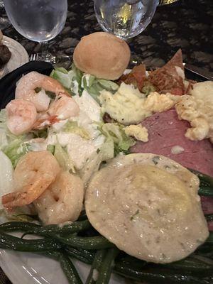 Prime rib , mushroom ravioli, shrimp scampi