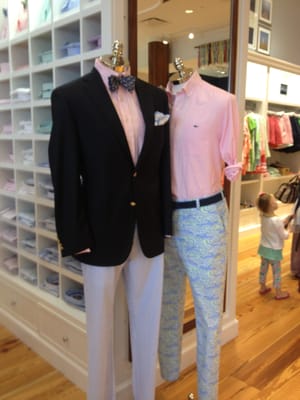 Prepster on steroids: seersucker pants, navy blue blazer, pocket silk, pink shirt ,bow tie with boat print.