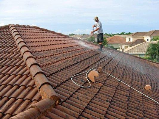 Barrel tile roofs can be tricky but they sure do clean up well