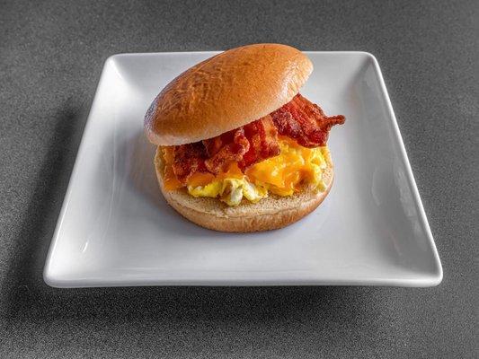 Bacon, Egg , & Cheese Sandwich (Toasted brioche bun with scrambled egg, bacon, and mild cheddar cheese)