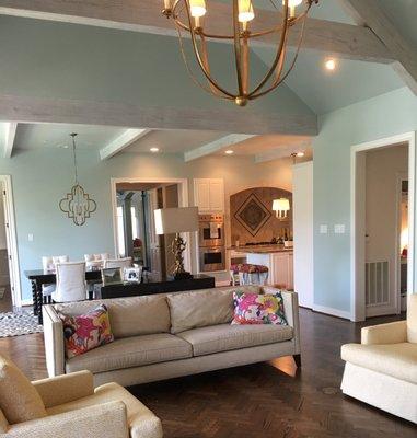 Happy colors in paint and fabrics transformed this family room.