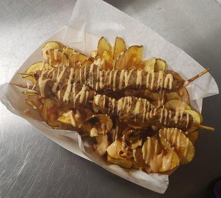 Finger Steaks
Bite sized ribeye battered and fried on skewers with a side of ribbon fries.