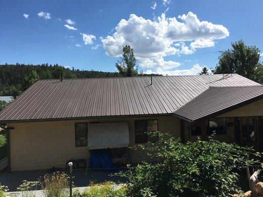 Repainting a propanel roof protects it and gives it a fresh new look