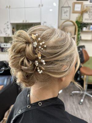 Soft, romantic and elegant updo.