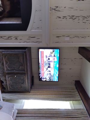 Full motion wall mounted flat screen.