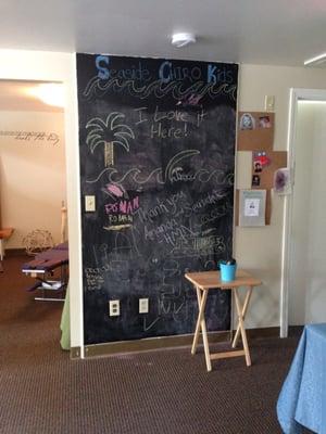 A chalk-board wall ready for children to mark with their creative art