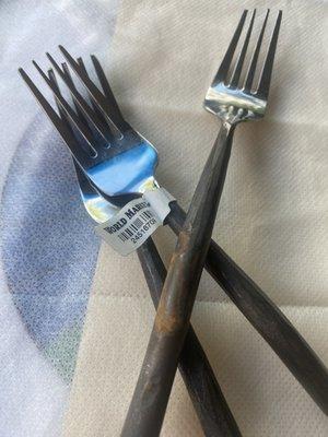 The top fork is a result of one use.  World market products are incredibly cheap Don't be fooled by their packaging or displays.