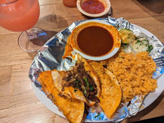 Can't go wrong with birria tacos and a strawberry margarita