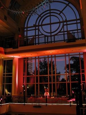 Orange and Amber lights reflected of the arches